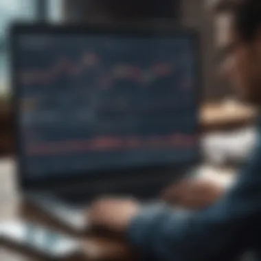 A person analyzing stock charts on a laptop